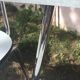 Table and 4 green water formica chairs 60's