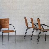 Set of 4 stackable dining chairs in steel and rattan, 1970s