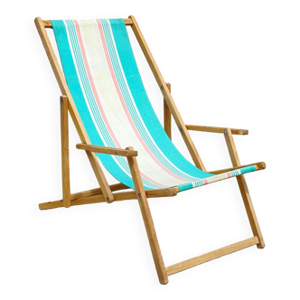 Folding deckchair in wood and vintage canvas