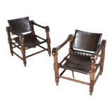 Pairs of vintage Safari style armchairs in wood and leather