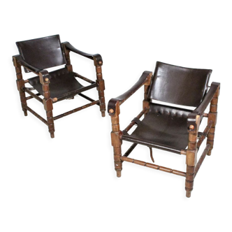 Pairs of vintage Safari style armchairs in wood and leather