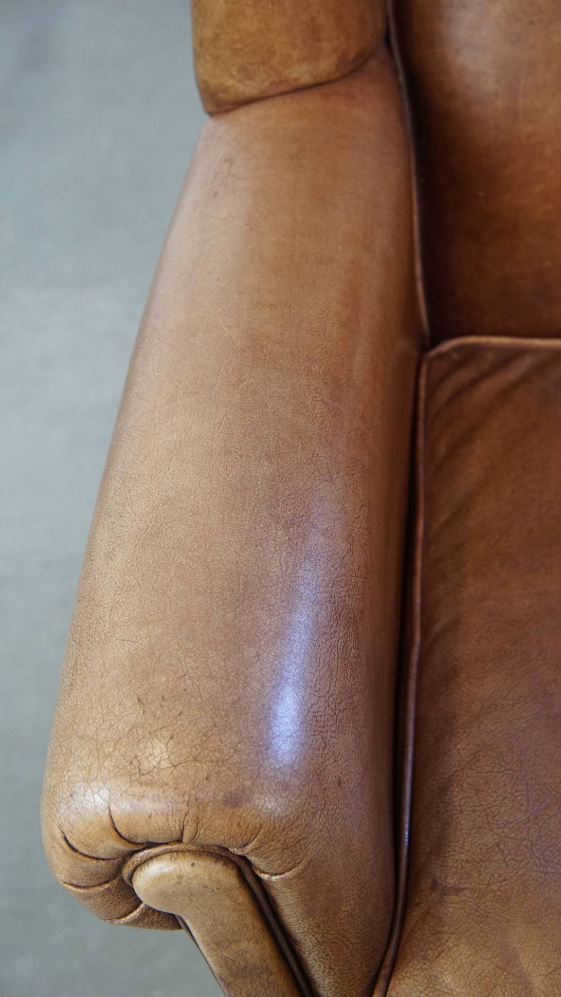 Cowhide Leather Wingback Chair in Light Cognac Color