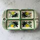 Serving dish with floral decoration signed