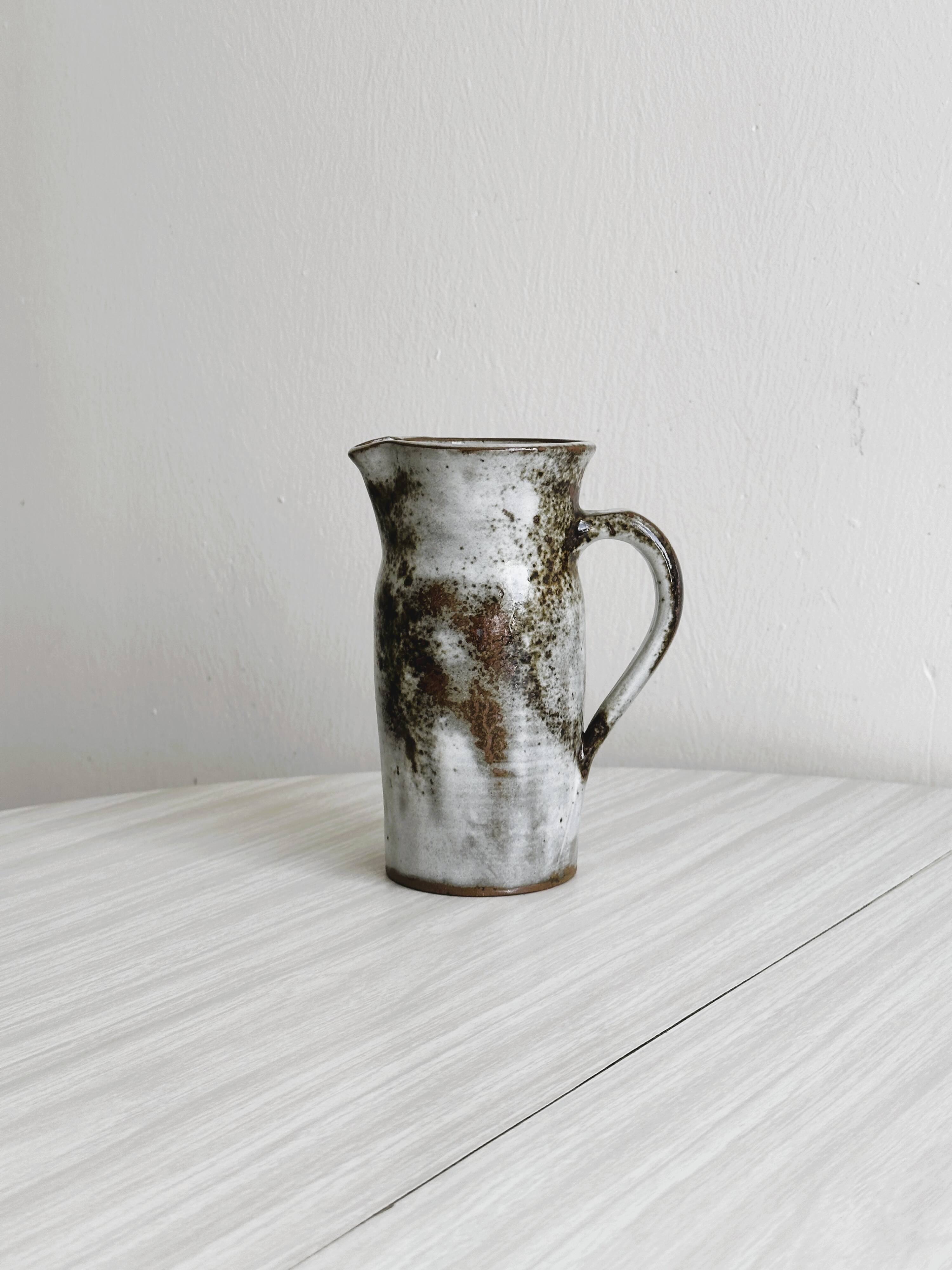 Small sanded stoneware pitcher signed Chantal and Thierry Robert