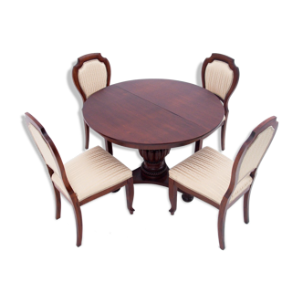 Antique table and chairs, Western Europe, circa 1900. Renovated.