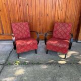 Pair of Art Deco burgundy armchairs in curved wood and fabric by Jindrich Halabala (1930s)