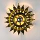 Sunburst ceiling light fixture or sconce in gilt wrought iron, Spain, circa 1960s
