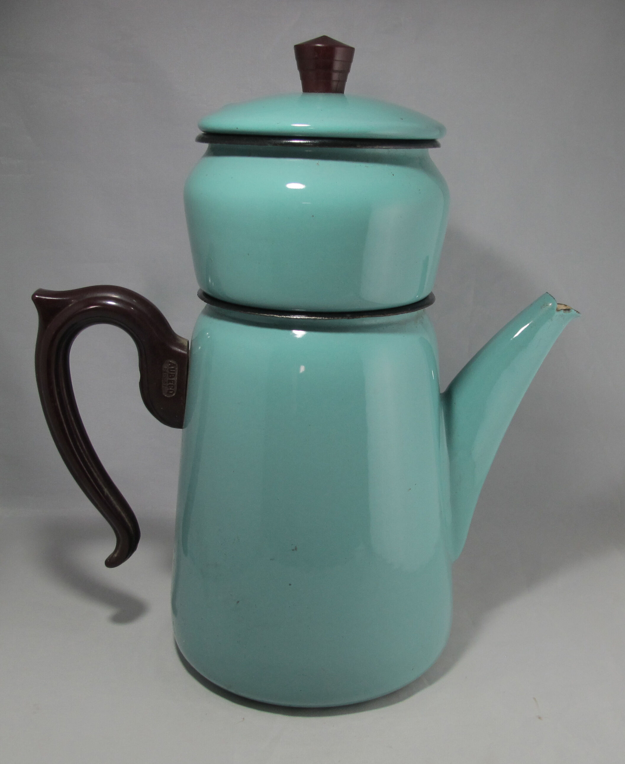 large vintage coffee maker made of enamelled sheet metal