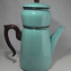 large vintage coffee maker made of enamelled sheet metal