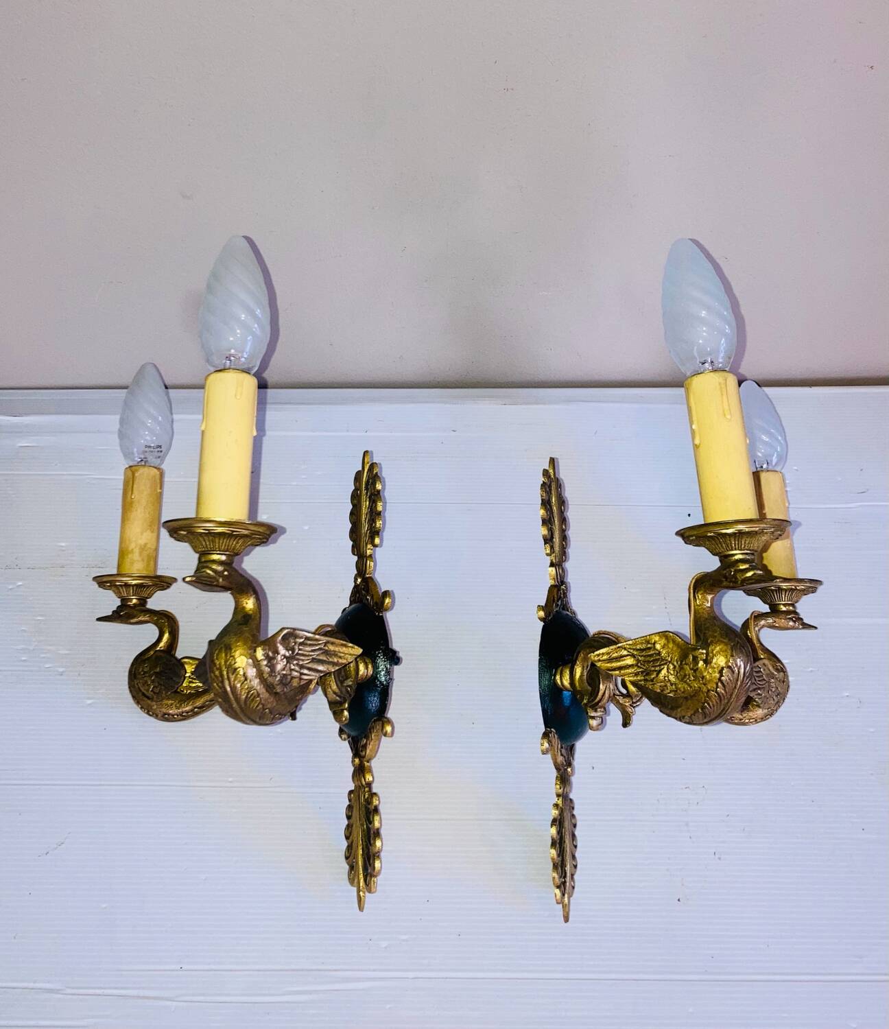 Empire bronze sconces with decorations of swans, palmettes and acanthus leaves