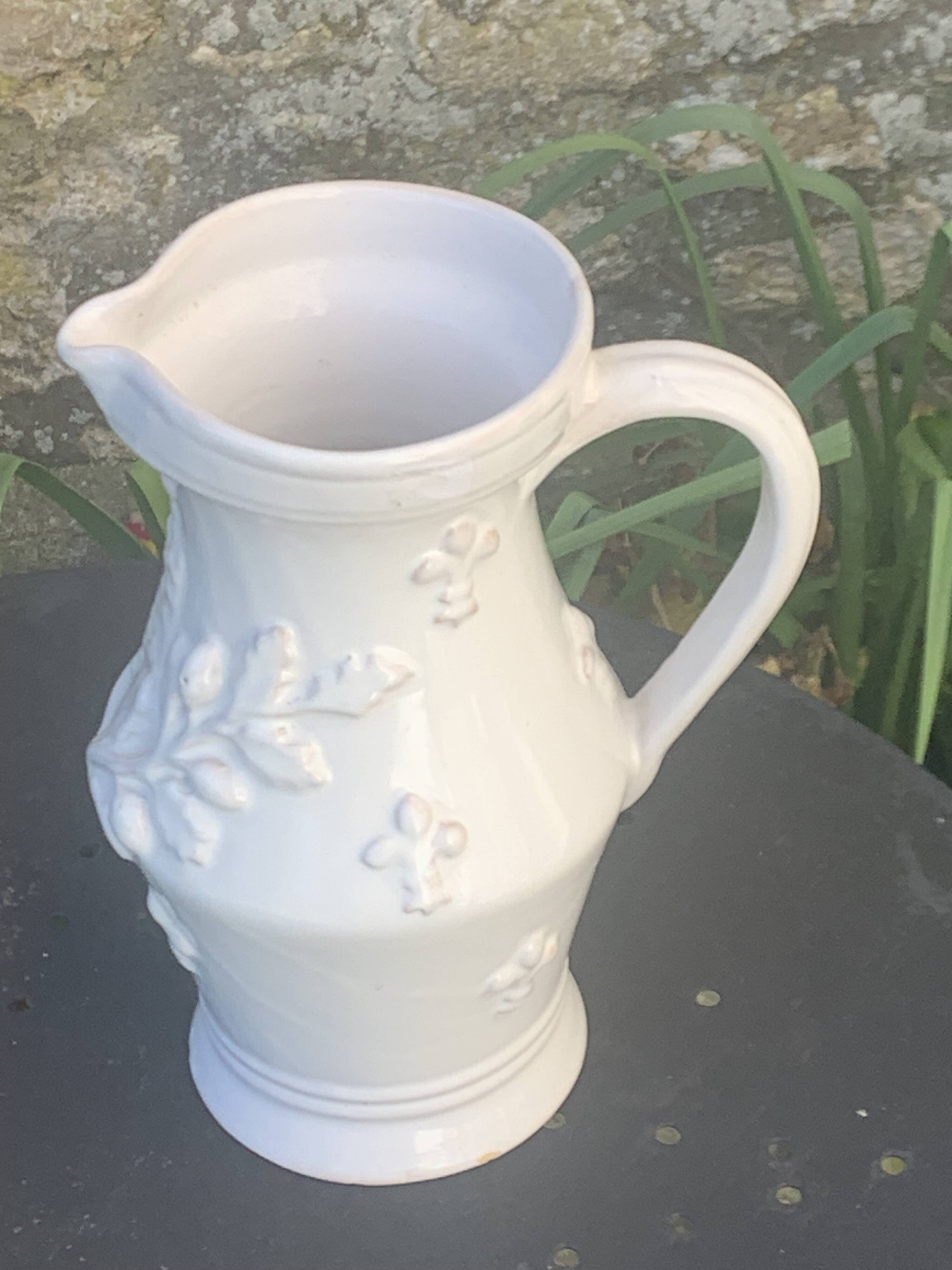 Carafe, pitcher signed Émile Tessier, Old France, in slip, ceramic