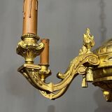 Lustre en bronze de style Louis XIV.