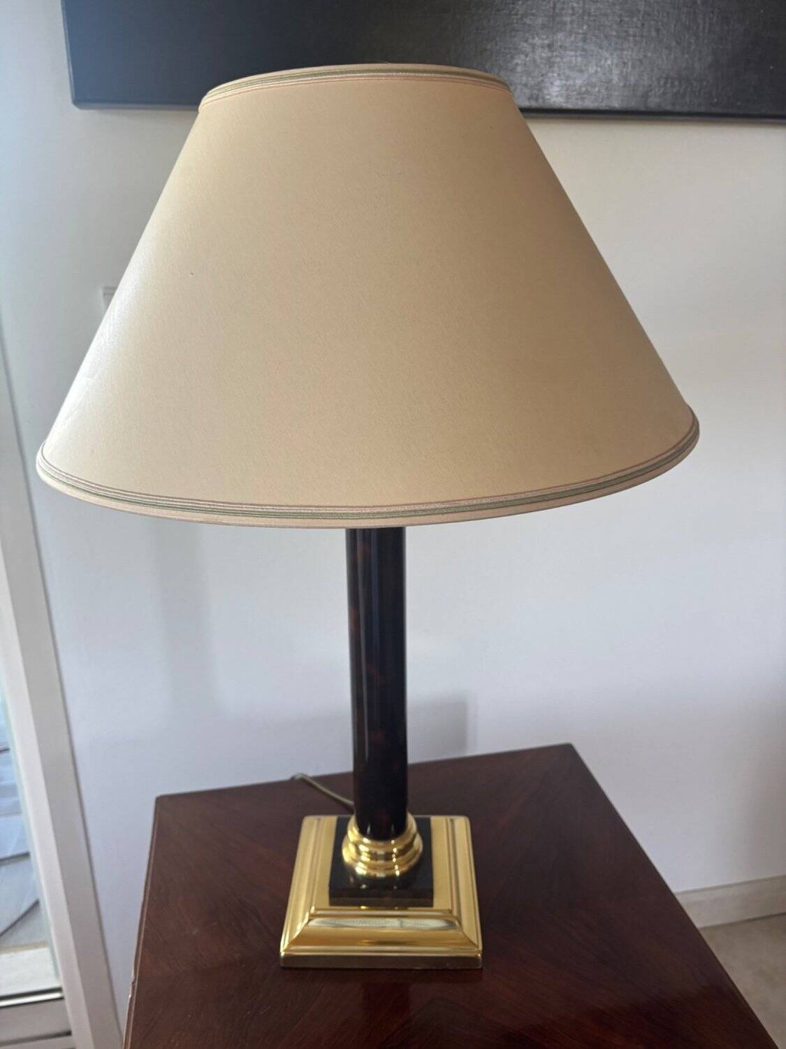 Empire style table lamp, gilded brass and black lacquered.