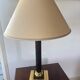 Empire style table lamp, gilded brass and black lacquered.