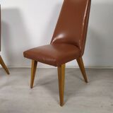8 brown skai chairs 1950