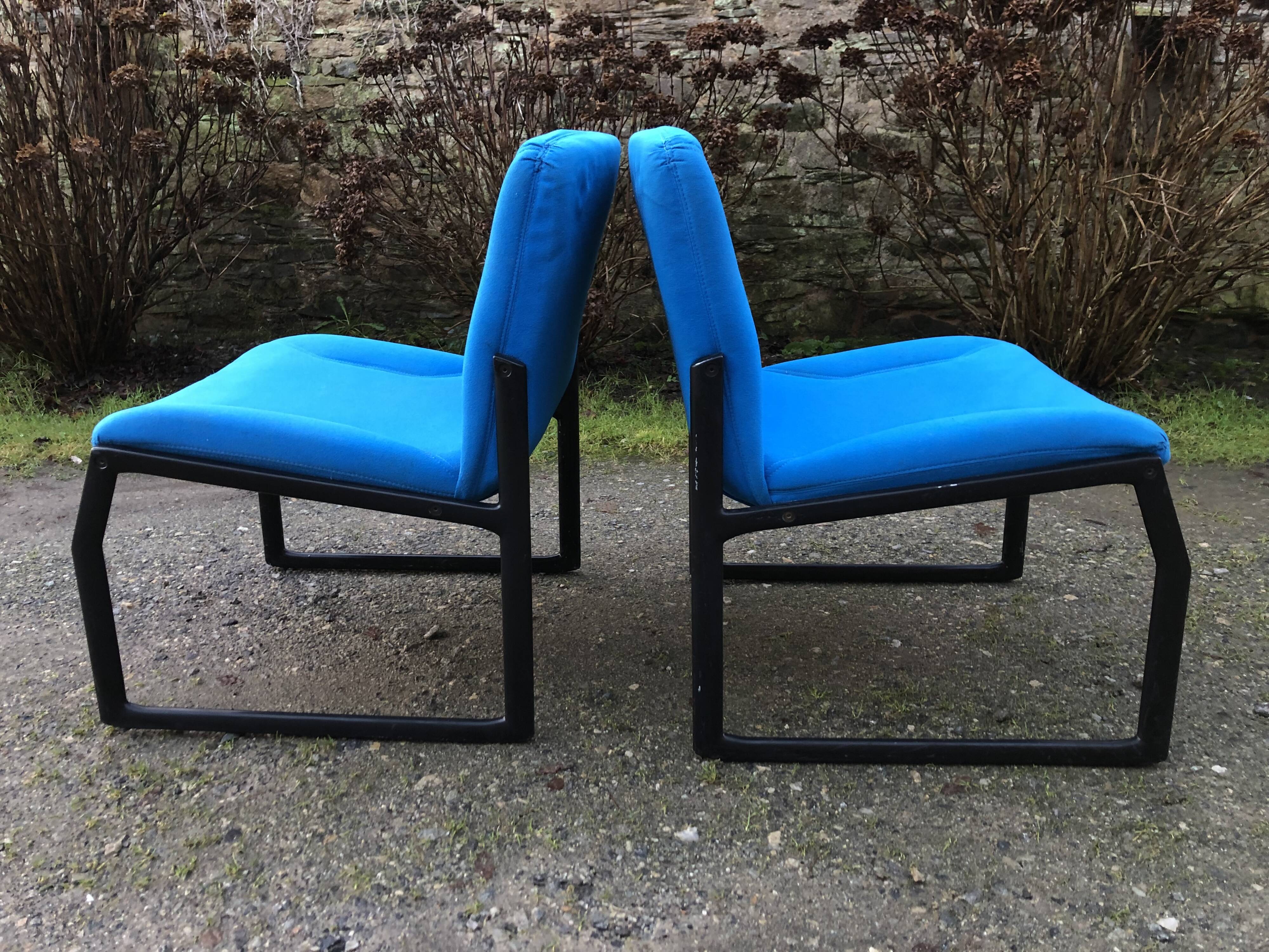 Electric blue fabric designer armchairs with black lacquered metal legs from the 80s.