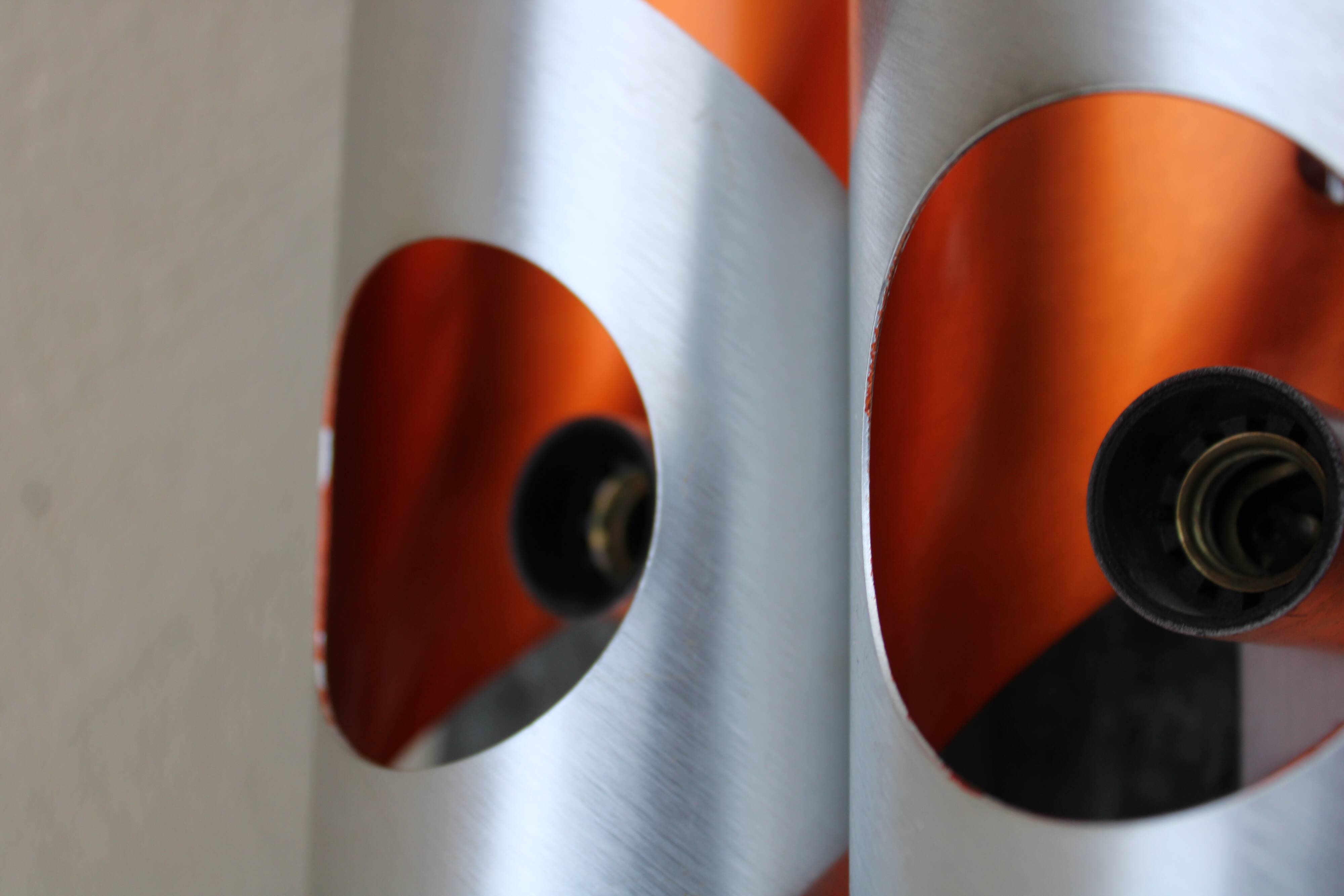 Pair of orange brushed aluminum wall light
