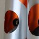 Pair of orange brushed aluminum wall light