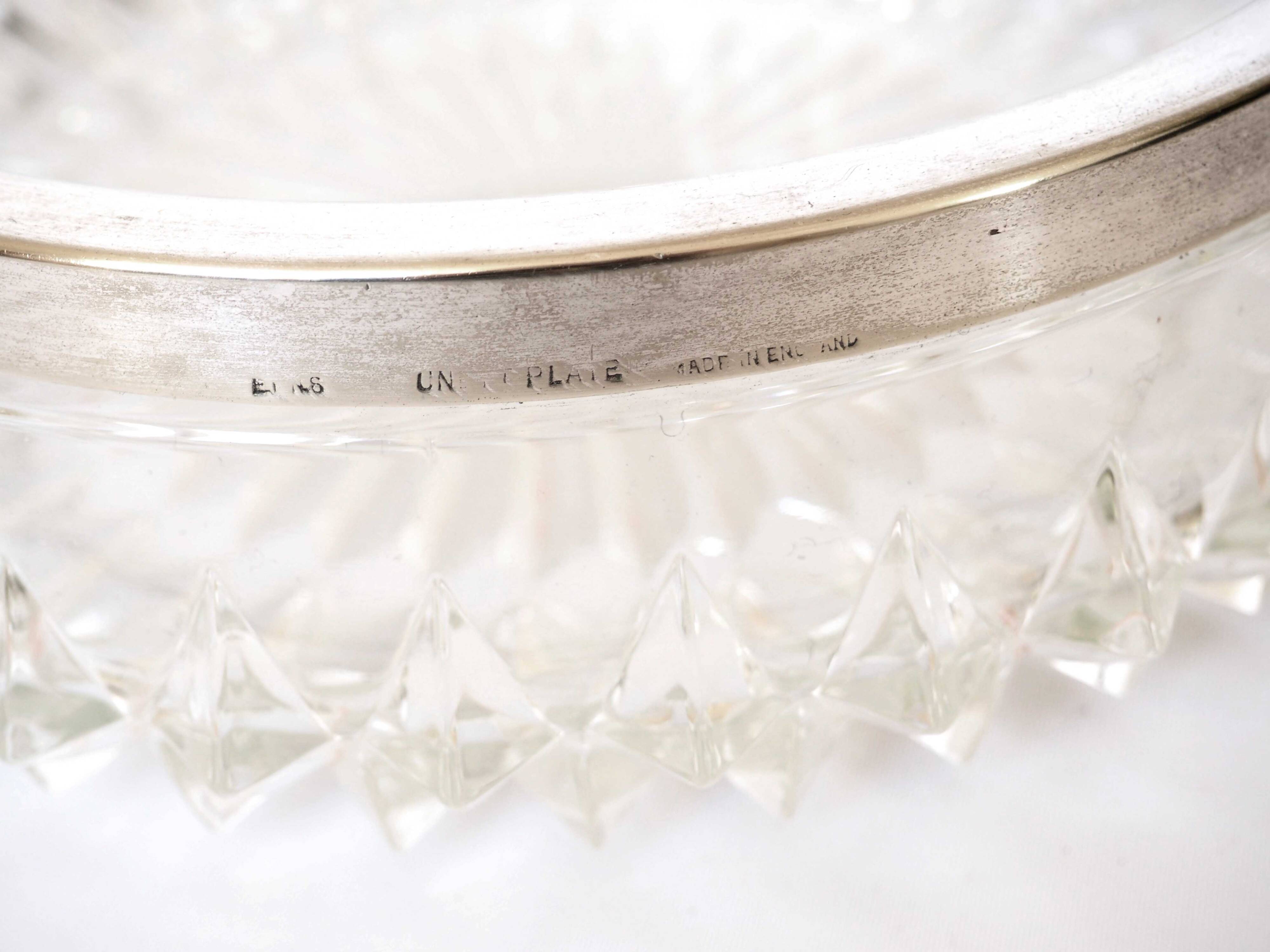 Silver rimmed glass empty pocket