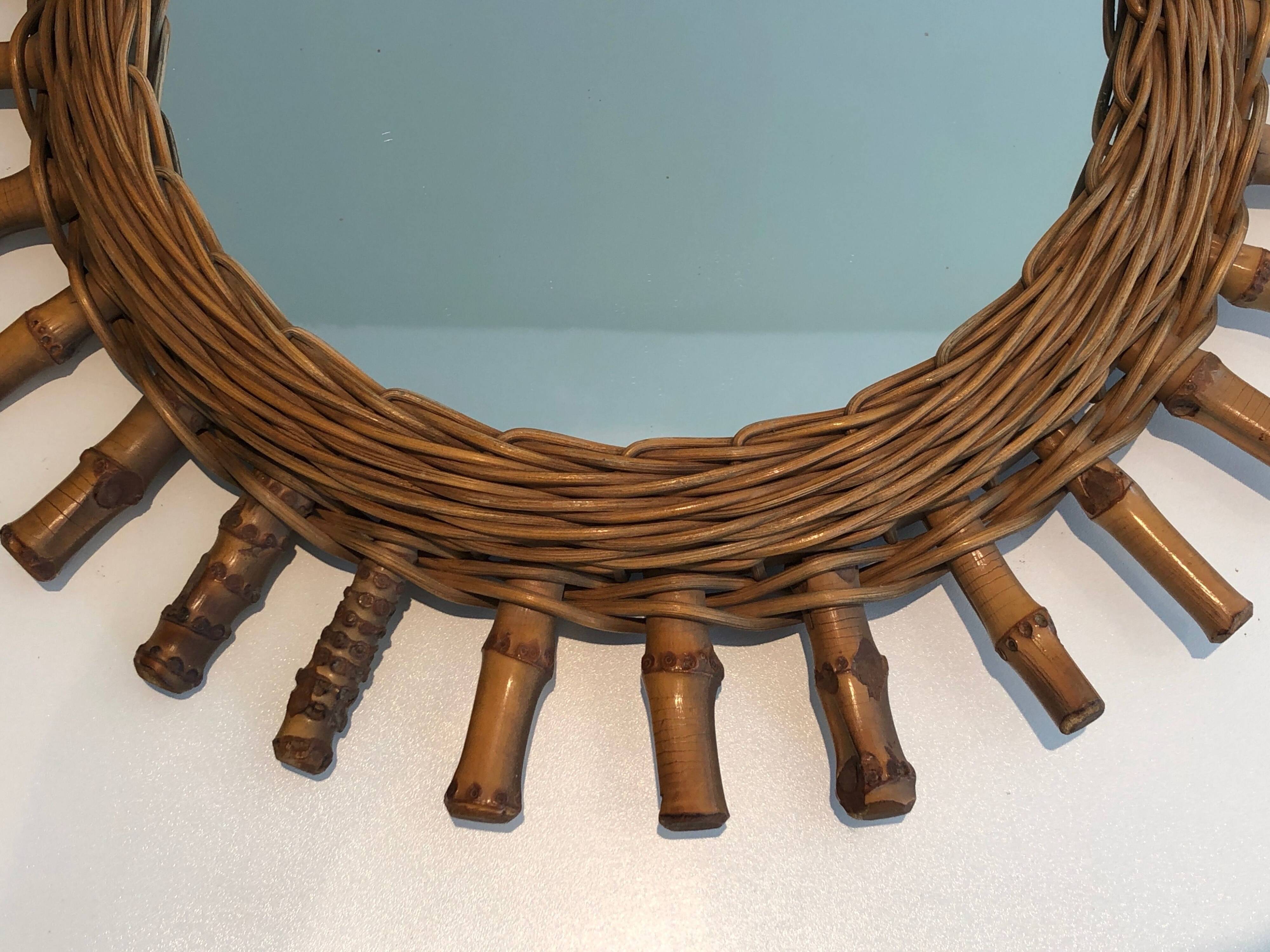 Round rattan mirror