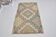 Tapis tribal vintage géométrique