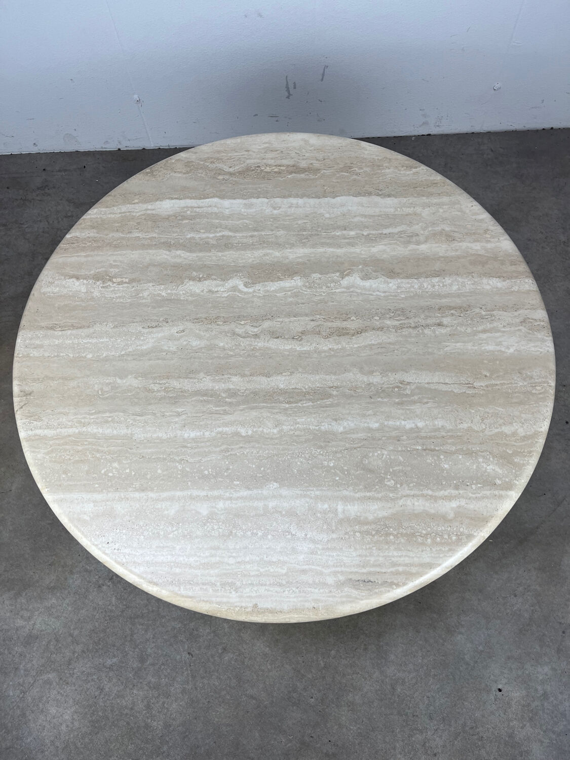 Round travertine coffee table