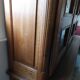 Showcase library with two sections in solid oak.