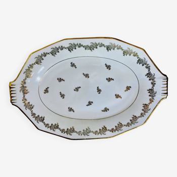 Plat de service ovale en porcelaine et dorures