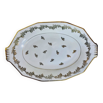 Plat de service ovale en porcelaine et dorures