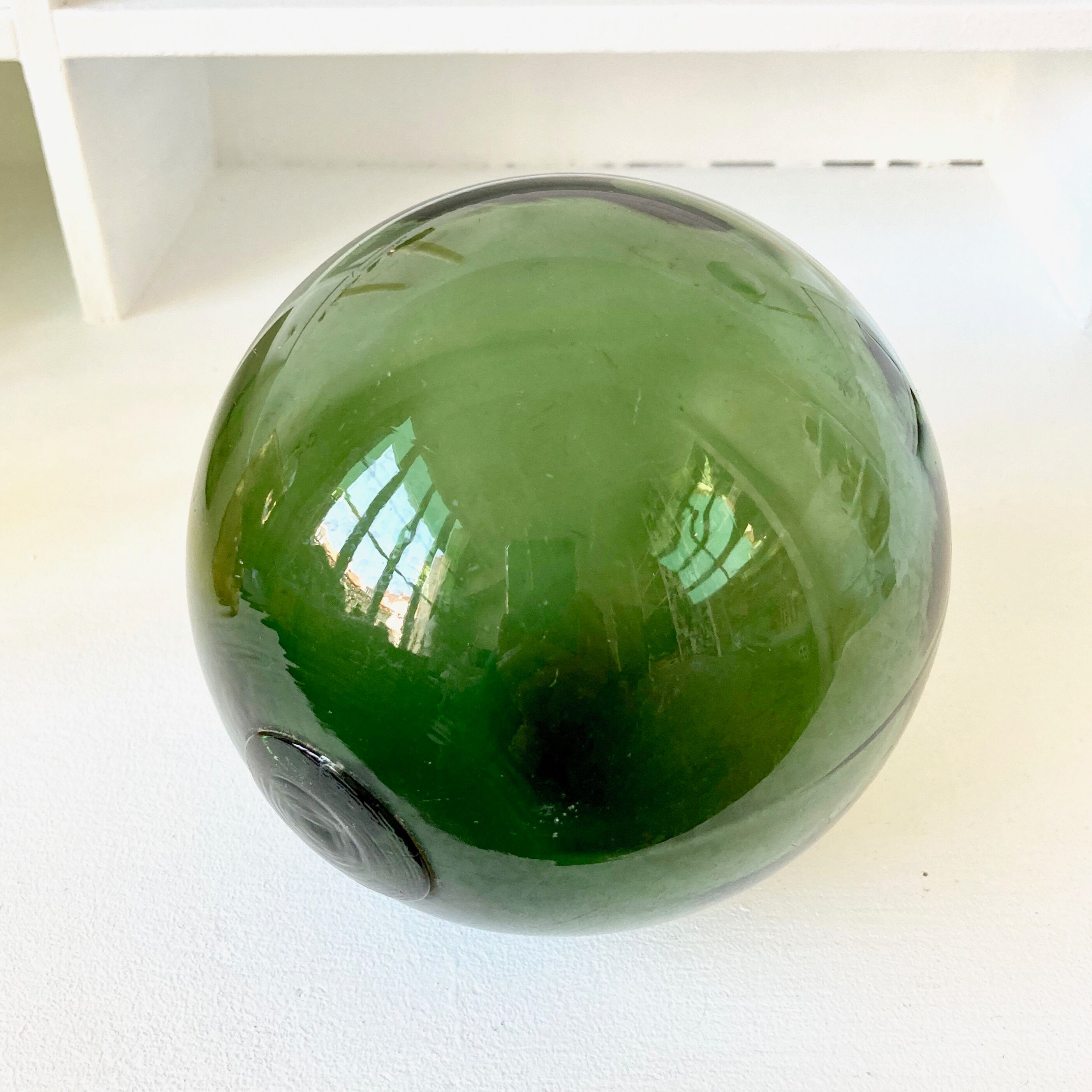 Green blown glass ball, old fishing float