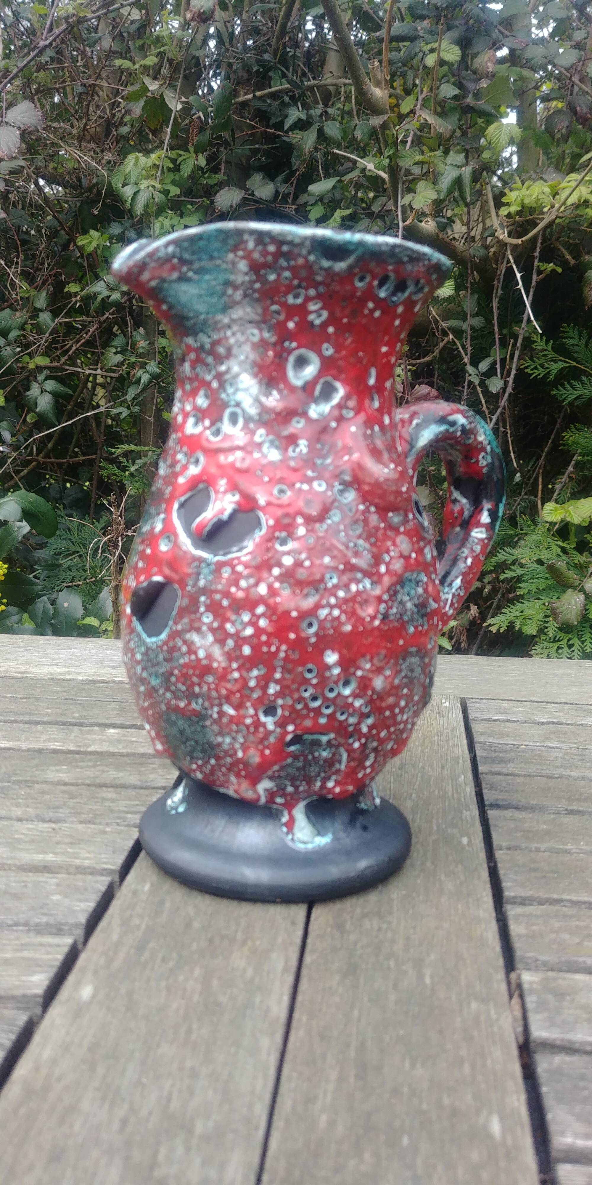 Glazed ceramic pitcher in Fat Lava style
