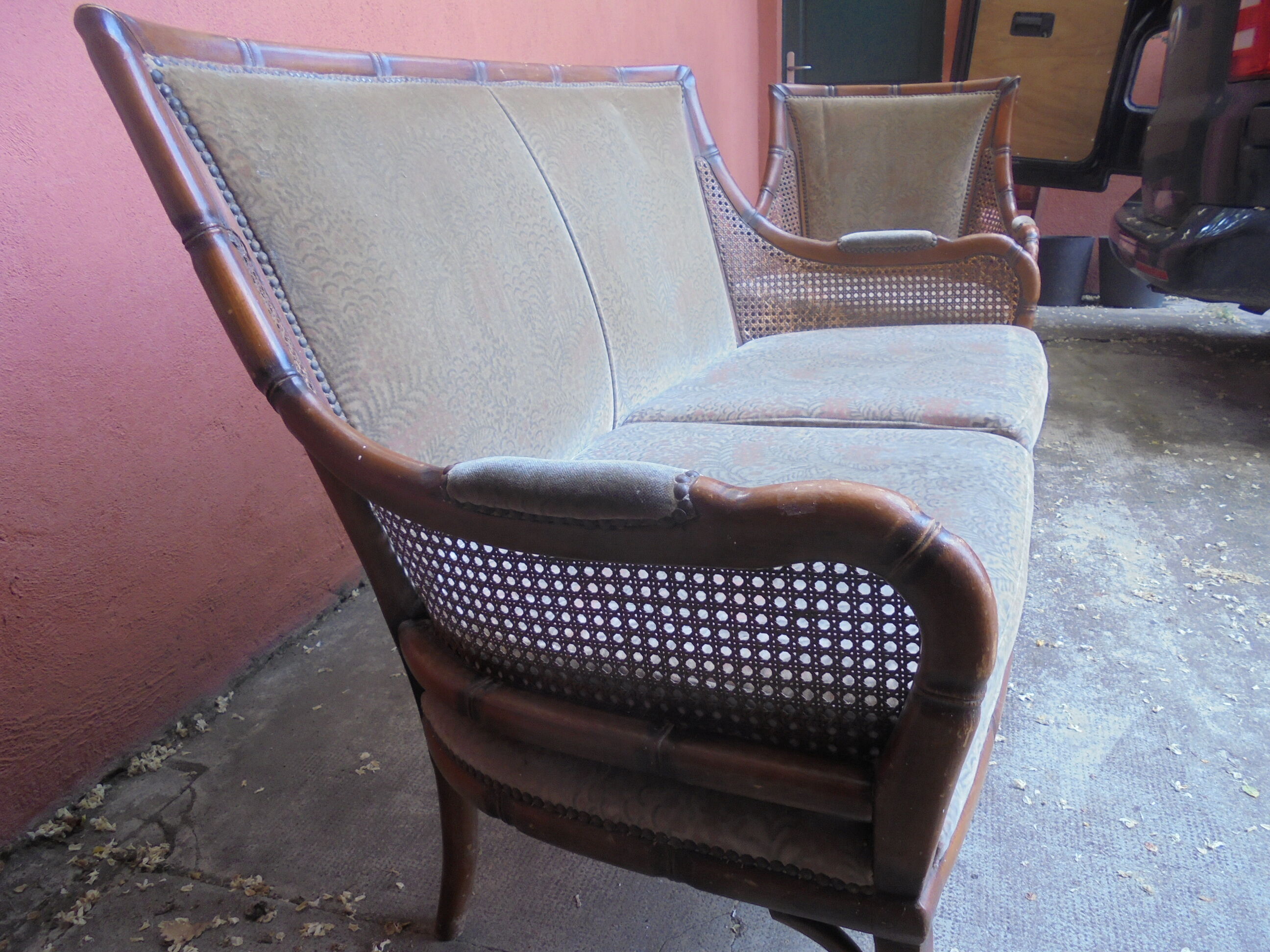 Rattan cane sofa and armchair circa 1970