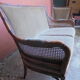 Rattan cane sofa and armchair circa 1970