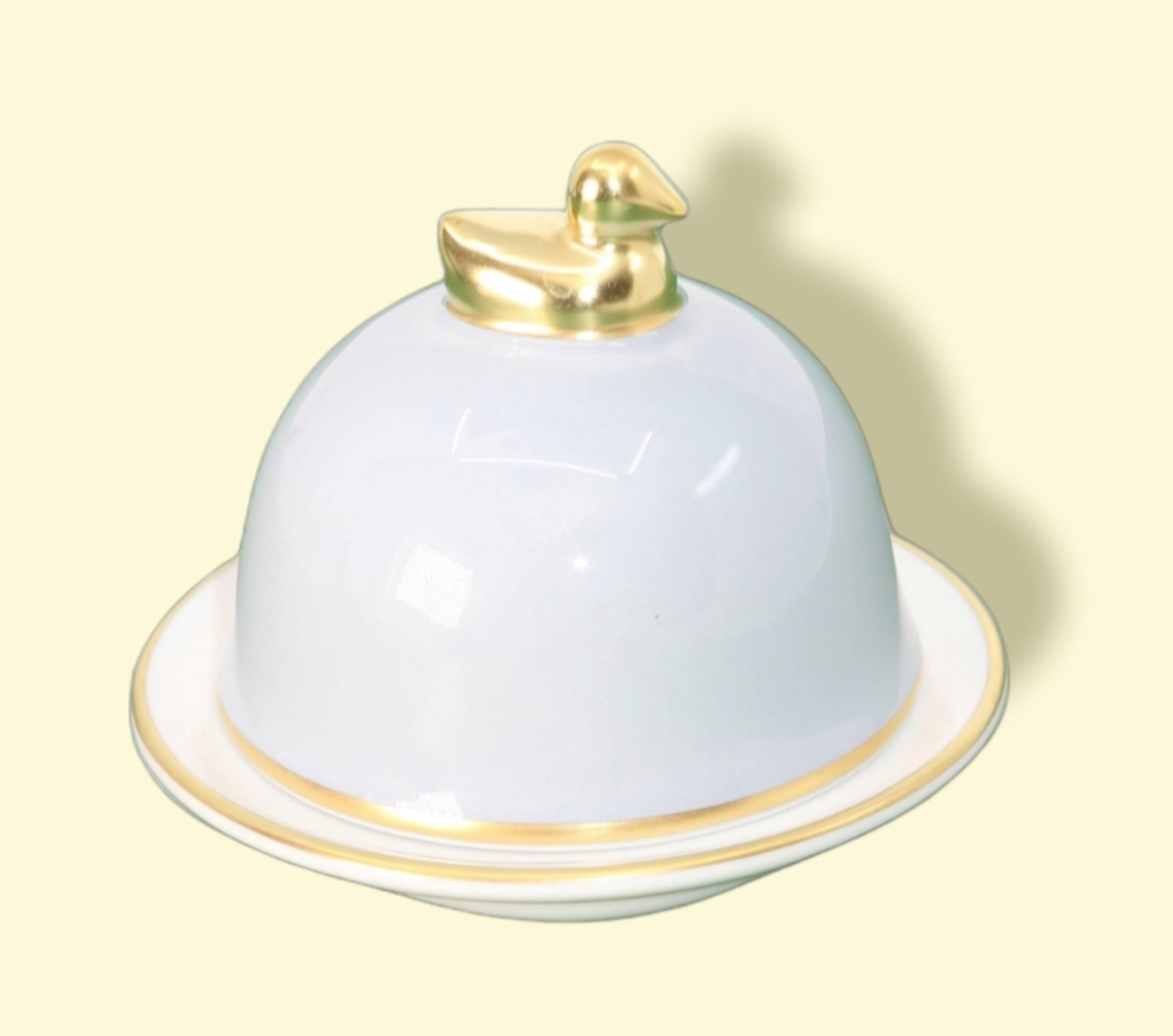 Silver-grey porcelain butter dish limoges legle under the sun