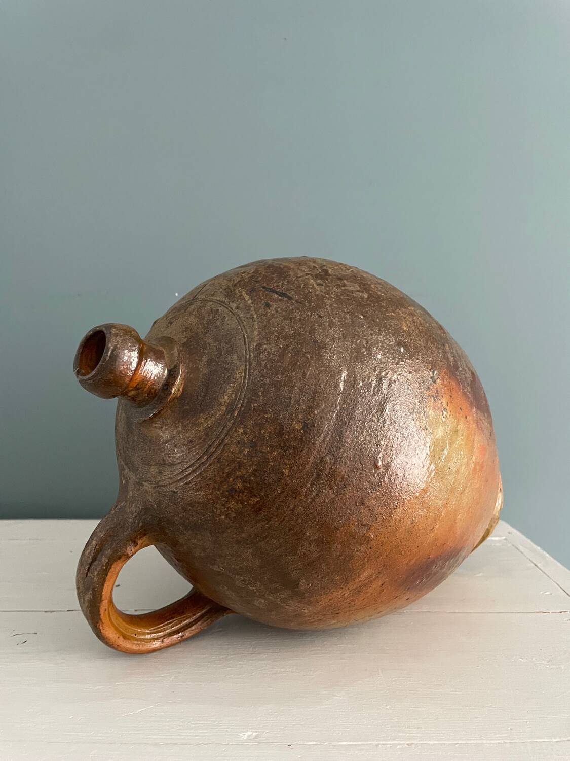 Large 19th century oil bottle in glazed earthenware