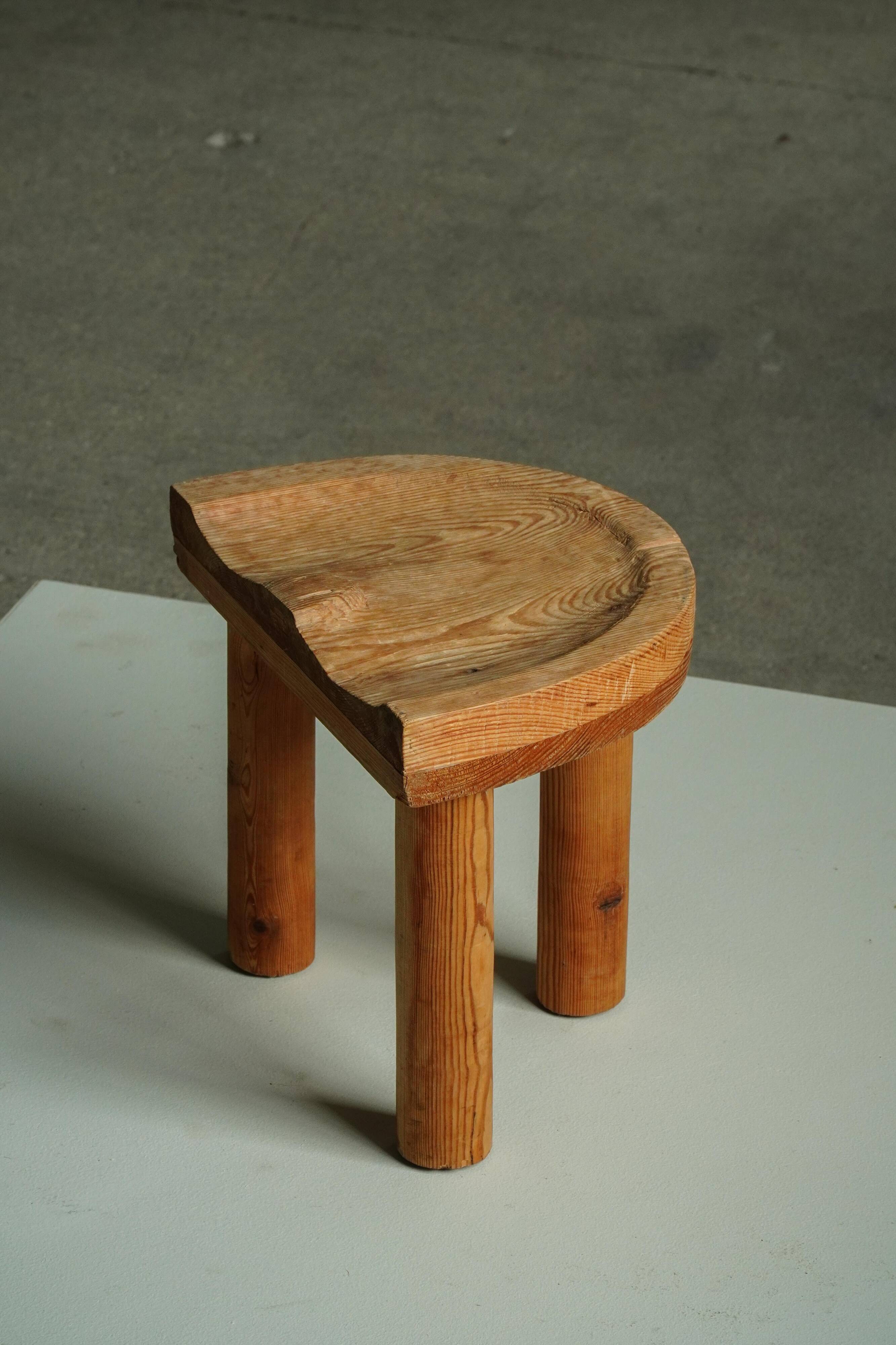 Carved pine stool, Swedish folk art, mid-20th century, 1950s.