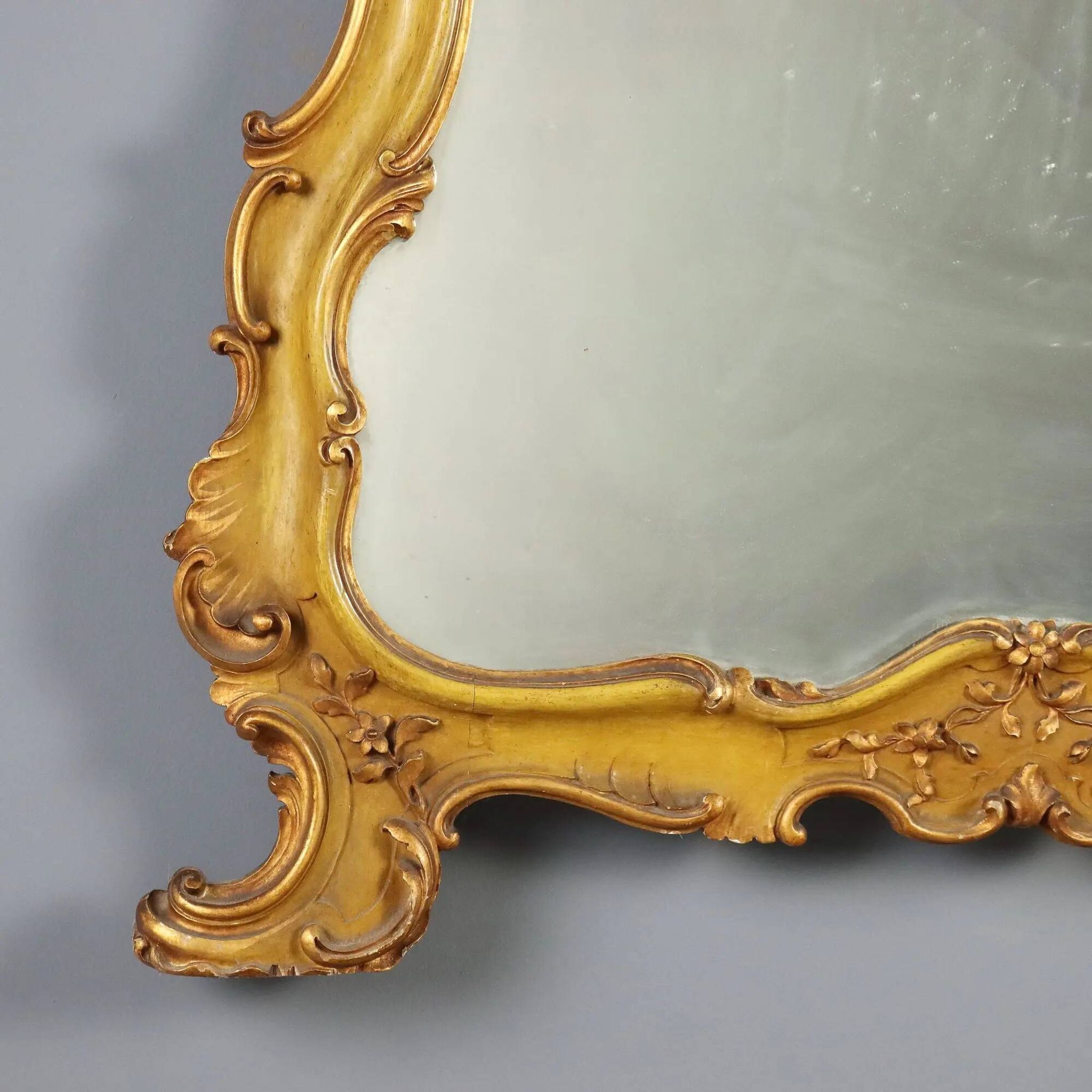 Antique baroque-style mirror in gilded carved wood, Italy 19th century.