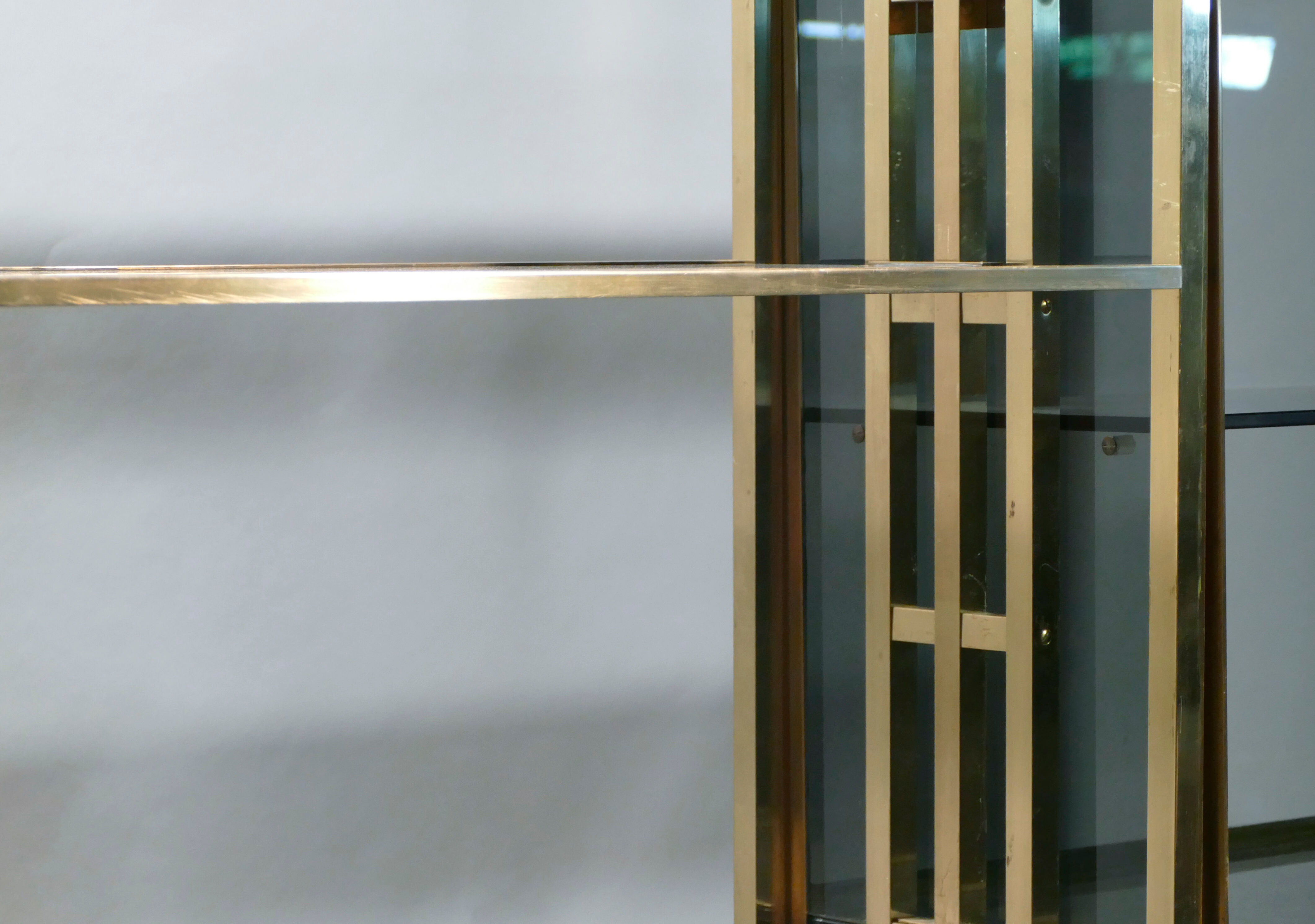 Brass laced library shelf by Kim Moltzer 1970