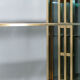 Brass laced library shelf by Kim Moltzer 1970