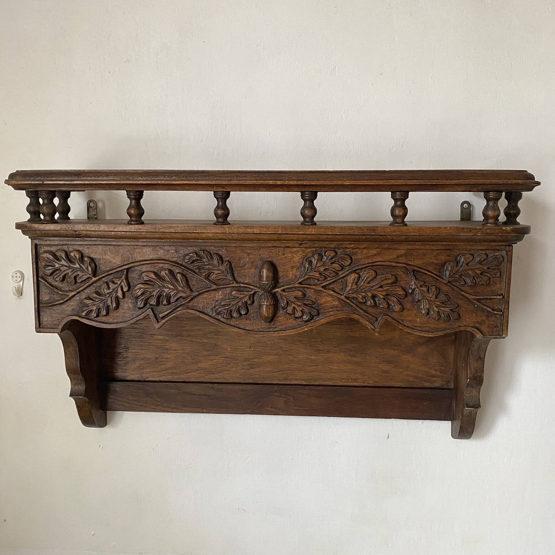 Old carved wooden kitchen shelf