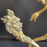 Old table lamp in bronze and brass gilded with satyr and snake