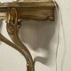 Pair of wall-mounted consoles with a mirror in Louis XV style.