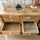 Old wooden workbench with 8 drawers.