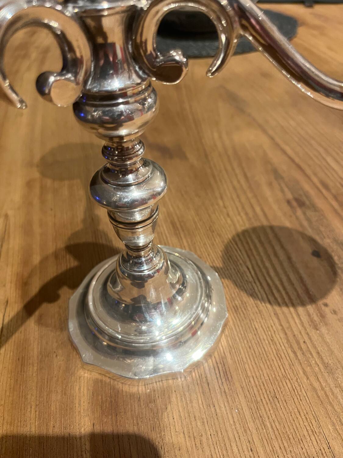 Pair of candelabra, three silver-plated metal lights