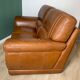 Two-seater leather sofa