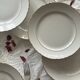 6 antique earthenware flat plates in off-white with gilding from Moulin des Loups.