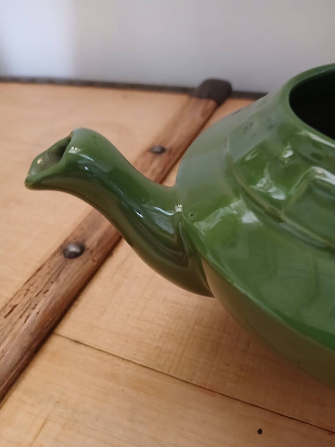 Green earthenware teapot