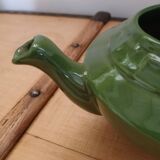 Green earthenware teapot