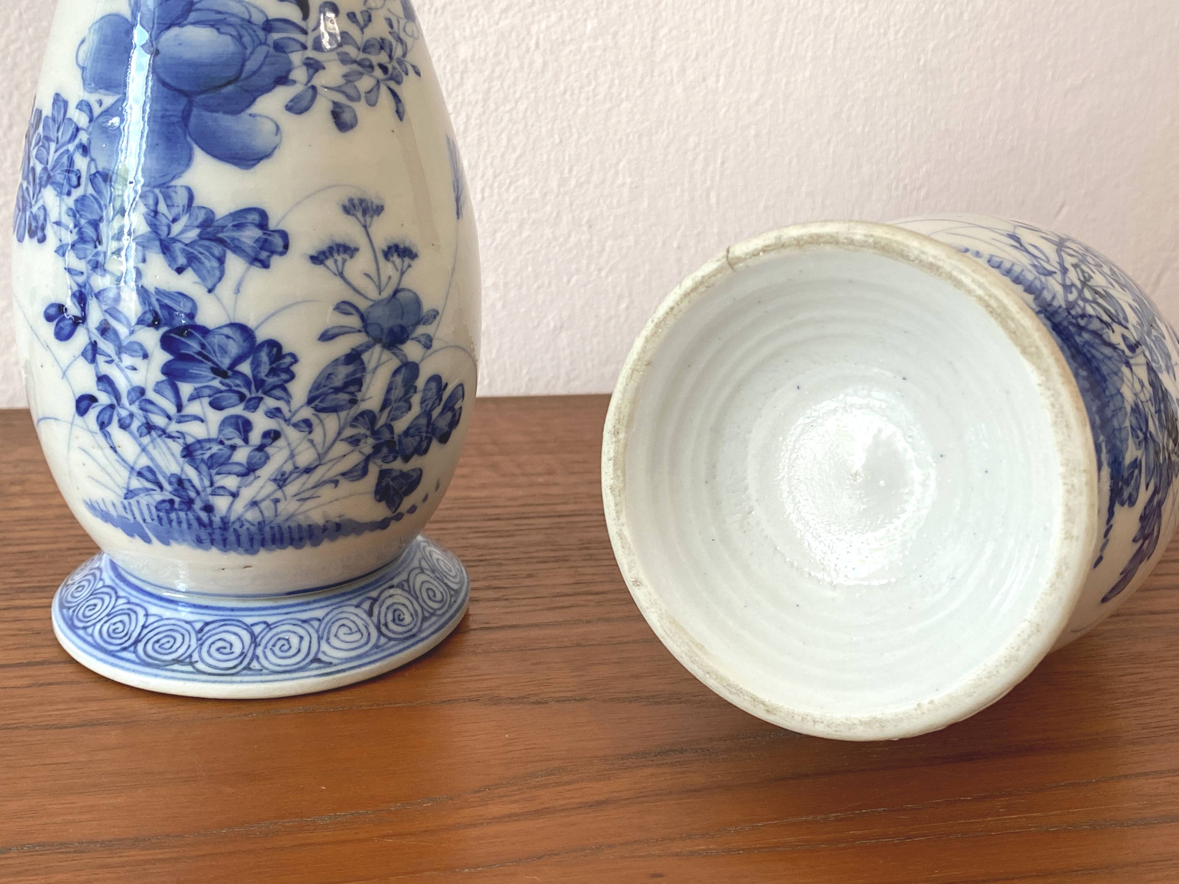 Old pair of blue and white porcelain vases from Japan - in good condition.