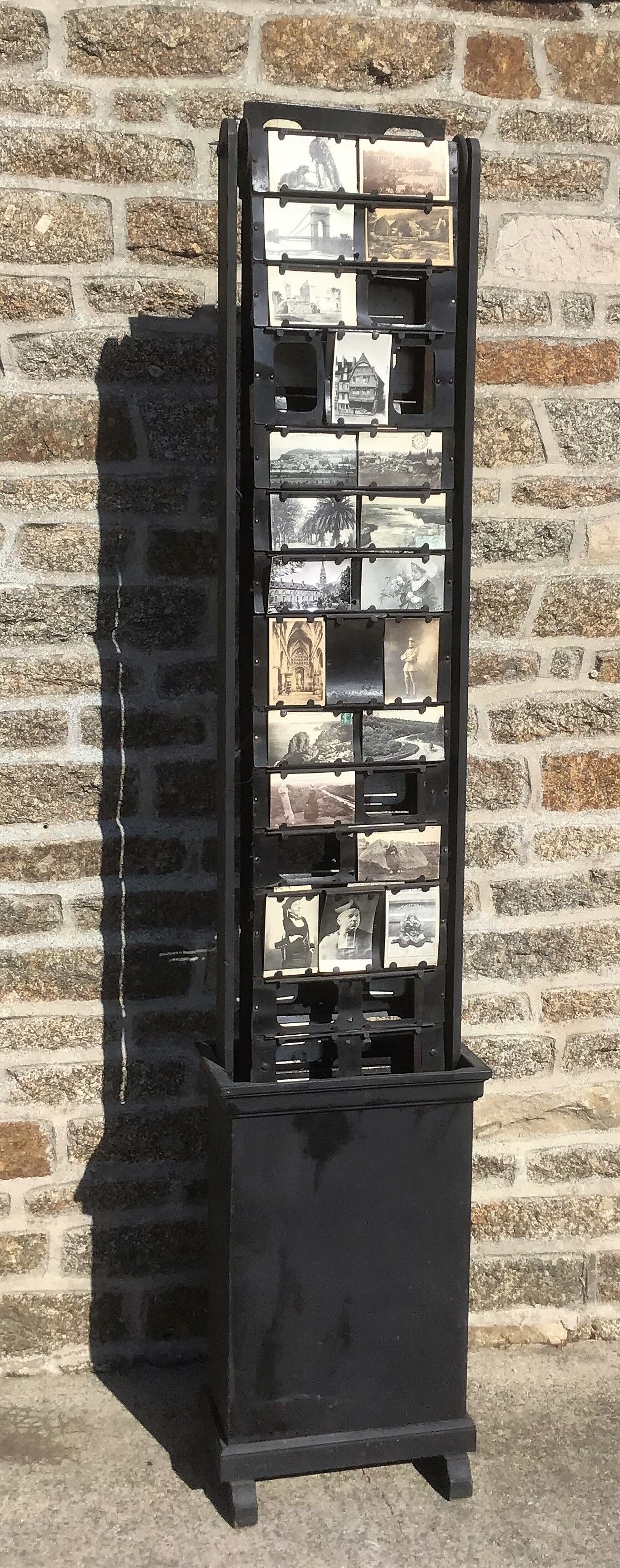 Former postcard drop-down display